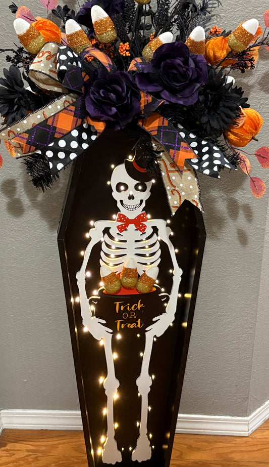 Halloween Skeleton Candy Corn Coffin Arrangement – Trick or Treat Light-Up Decoration