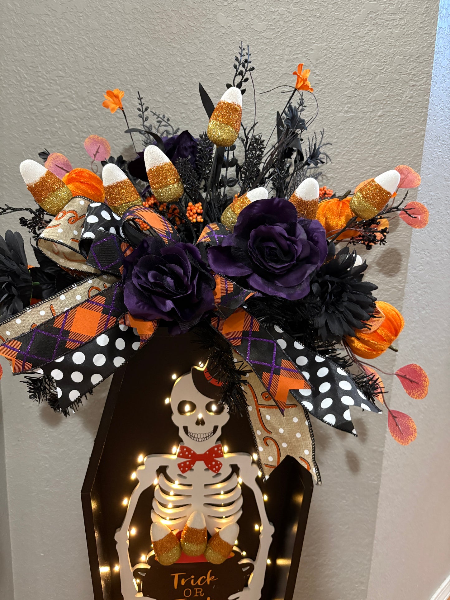 Halloween Skeleton Candy Corn Coffin Arrangement – Trick or Treat Light-Up Decoration